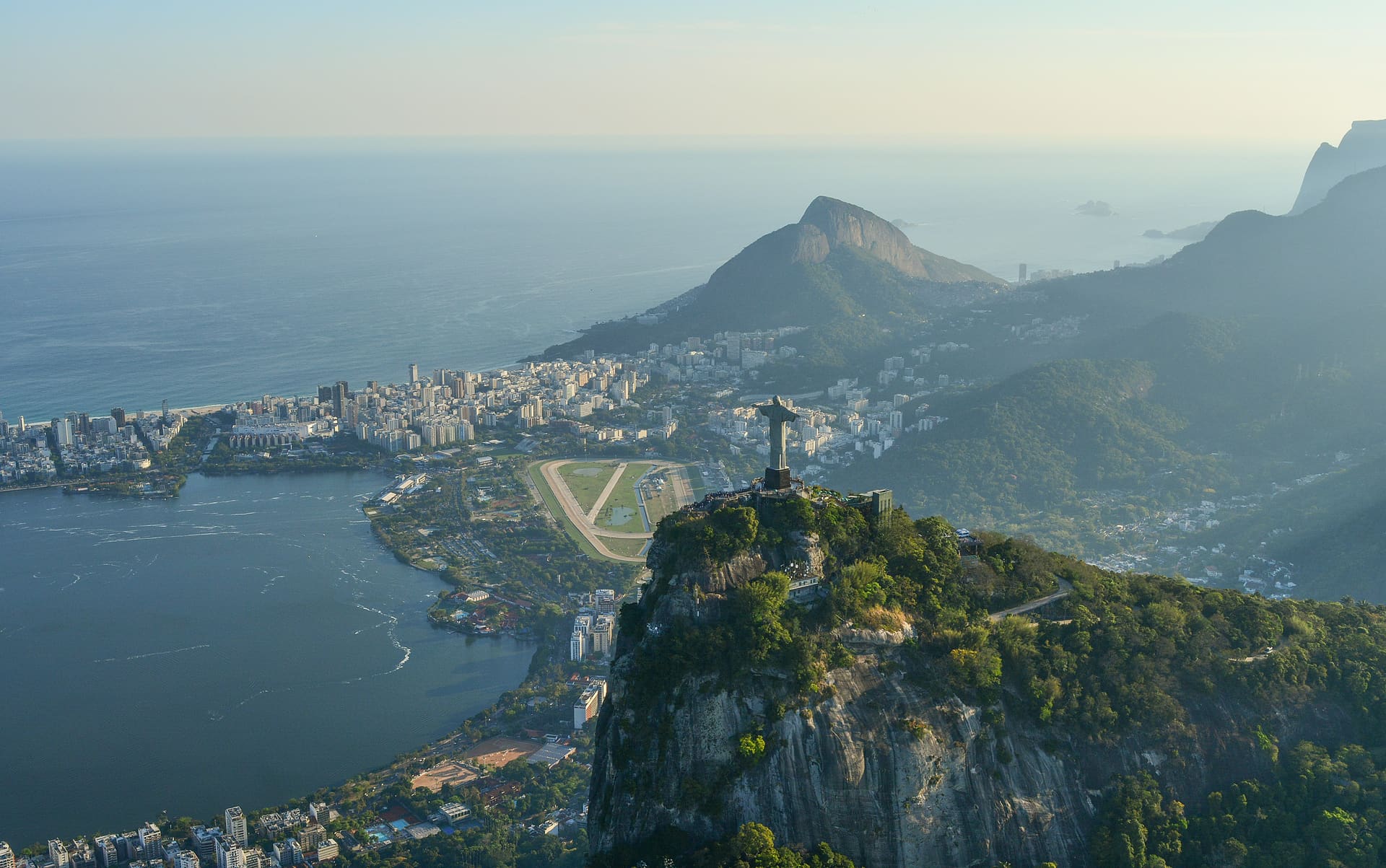 Christ the Redeemer above Rio de Janeiro with the coastline and lagoon behind